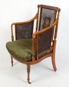 An antique Sheraton Revival satinwood armchair with cane sides and back, attractively hand-painted in the Angelica Kauffman style, late 19th century, 98cm high, 66cm across the arms - 3