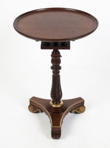 A Regency rosewood and beech wine table made in the Grecian style with ormolu mounts, circa 1820, 63cm high, 43cm diameter