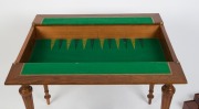 BOX-TABLE antique French walnut games table with flip top and casino top interior, 19th/20th century, fitted with three drawers with sliding lids containing numerous gaming pieces. Bearing Parisian maker's label. 74cm high, 90cm wide, 51cm deep - 8