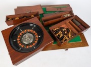 BOX-TABLE antique French walnut games table with flip top and casino top interior, 19th/20th century, fitted with three drawers with sliding lids containing numerous gaming pieces. Bearing Parisian maker's label. 74cm high, 90cm wide, 51cm deep - 9