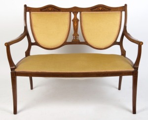 A Sheraton Revival inlaid mahogany salon settee with double shield back, circa 1900, ​​​​​​​89cm high, 118cm across the arms