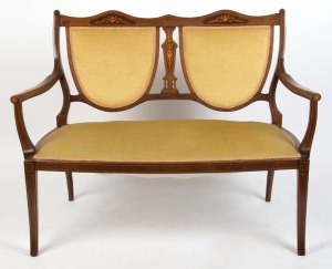 A Sheraton Revival inlaid mahogany salon settee with double shield back, circa 1900, 89cm high, 118cm across the arms