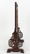 An antique Chinese jade and hard stone table screen in ornately carved timber stand 19th/20th century, 41cm high. - 2