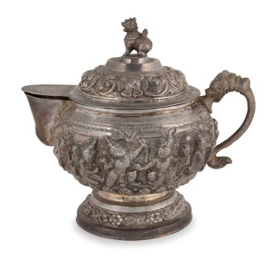 A Burmese silver lidded teapot with repousse decoration, 20th century, stamped "95 SILVER BURMA", ​​​​​​​12cm high