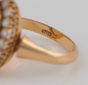 An 18ct yellow gold ring, set with a solid polished opal surrounded by brilliant cut white diamonds, stamped "750" - 3