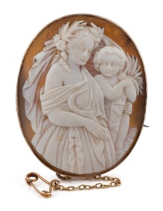 An antique 9ct gold mounted cameo brooch with unusual mother and child harvest scene, 19th century, 5cm high overall