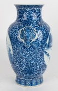 A Chinese ornate blue and white porcelain vase, adorned with vignettes of water scenes, landscapes, birds and blossoms, Guan Xu mark to base, 19th/20th century, 35cm high - 2