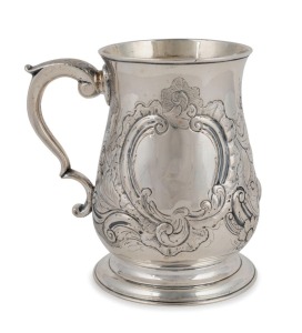 A Georgian sterling silver tankard of bellied form with floral repousse, engraved decoration and ogee foot, London, circa 1748, 13cm high, 328 grams