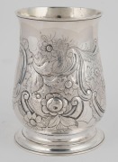 A Georgian sterling silver tankard of bellied form with floral repousse, engraved decoration and ogee foot, London, circa 1748, 13cm high, 328 grams - 2