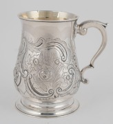 A Georgian sterling silver tankard of bellied form with floral repousse, engraved decoration and ogee foot, London, circa 1748, 13cm high, 328 grams - 3