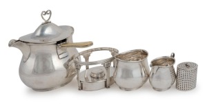 A rare silver plated campaign/travelling tea set comprising of original burner stand, hot water jug with ivory handle, strainer, cream jug and sugar pot, circa 1870, 14cm high overall