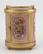 An antique French oval and porcelain panelled carriage clock timepiece with bell chiming alarm mechanism, gilt decorated dial and panels with musical motifs, circa 1900, engraved to the top "9 Août, 1906", 14cm high - 3