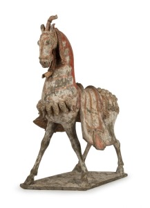 An important pottery figure of a Northern Qi Dynasty (550-577) warhorse, 69cm high, 42cm long. With University of Wollongong thermoluminescence documentation, plus certificate of authenticity from B.C. Galleries in Melbourne. PROVENANCE: Philip Caldwell Auctions, Private Collection Melbourne