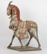 An important pottery figure of a Northern Qi Dynasty (550-577) warhorse, 69cm high, 42cm long. With University of Wollongong thermoluminescence documentation, plus certificate of authenticity from B.C. Galleries in Melbourne. ​​​​​​​ PROVENANCE: Philip Ca - 2