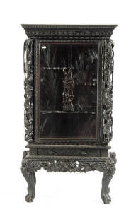 A Japanese hardwood rectangular display cabinet, early 20th century, with two shelves, 168cm high, 83cm wide and 44cm deep