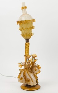 A Murano figural glass table lamp and shade in amber and cream, mid 20th century, ​​​​​​​56cm high