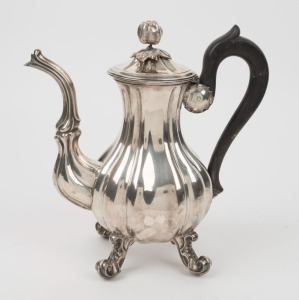 An antique French silver coffee pot with carved wooden handle, 25cm high
