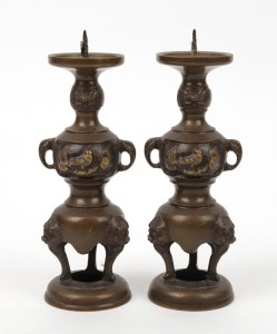 A pair of Japanese bronze candlesticks, 19th/20th century, 19cm high