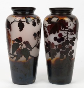 A pair of French cameo glass vases with bramble and grape motifs, early 20th century, monogram mark to sides (illegible), purchased from Kozminsky's, Melbourne in 1996, 25cm high
