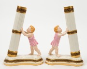 ROYAL WORCESTER pair of antique English figural porcelain vases, circa 1880, puce factory mark to the bases, ​​​​​​​22.5cm high