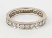A white gold and brilliant cut diamond eternity ring, ​​​​​​​2.4 grams total - 2