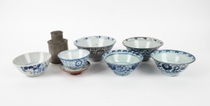 Seven assorted antique blue and white porcelain dishes and a Chinese pewter tea caddy, (8 items), the caddy 12cm high