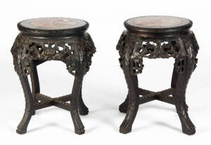 A pair of Japanese marble top tables, early 20th century, 46.5cm high, 30cm diameter