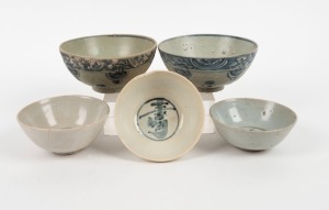 Five assorted antique Chinese porcelain bowls, Ming Dynasty, the largest 7cm high, 14cm diameter