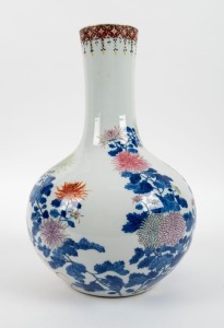 A Chinese blue and white porcelain vase with floral enamel decoration, 20th century, 41cm high