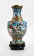 A Chinese cloisonne vase with crane decoration, on carved timber stand, 20th century, 44cm high overall