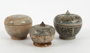 Three antique Thai ceramic circular boxes, 15th/16th century, ​​​​​​​the largest 12cm high