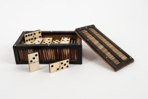 Assorted antique whalebone and ebony domino tiles in a Ceylonese ebony and porcupine box with bone inlay, 19th century, ​​​​​​​the box 17cm wide