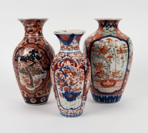 Three antique Imari porcelain baluster shaped vases, 19th century, the largest 25cm high