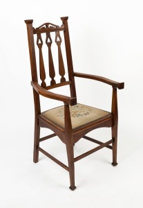 An antique English Aesthetic Movement walnut armchair, late 19th century, 116cm high, 51cm across the arms