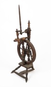 An antique stained timber parlour spinning wheel, 19th century, 111cm high