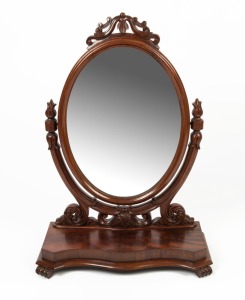 An antique English mahogany dressing mirror, serpentine plinth base with scroll feet, oval mirror with well carved supports, 19th century, ​​​​​​​93cm high, 66cm wide, 29cm deep