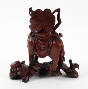 A Chinese carved box wood figural group of a man on a elephant 20th century, ​​​​​​​26cm high. - 2