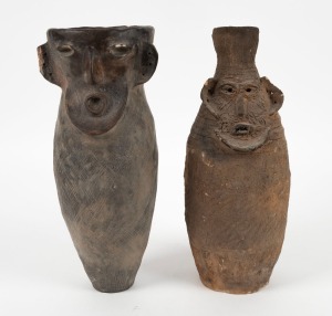 Two Jomon Japanese pottery face vases, 34cm high