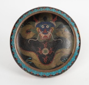 An antique Chinese cloisonne dragon bowl, Qing Dynasty, 19th century, four character seal mark to base, 7cm high, 20cm diameter