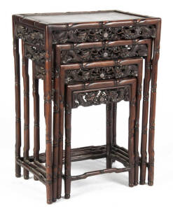 A Chinese nest of four tables, early 20th century, 71.5cm high
