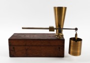 An antique wheat bushel measure, in original mahogany case, 19th century, ​​​​​​​the case 33cm wide