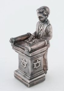JUDAICA sterling silver statue of a boy reading the Torah, 20th century, stamped "Sterling, 925", 10.5cm high