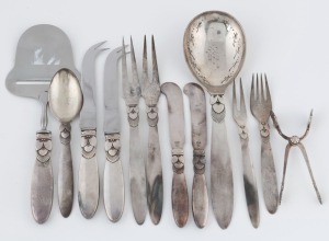 GEORG JENSEN "Cactus" pattern Danish sterling silver utensils, designed by GUNDORPH ALBERTUS in 1930, (12 pieces), oval factory marks, the largest 23cm long, 340 grams silver weight not including knives