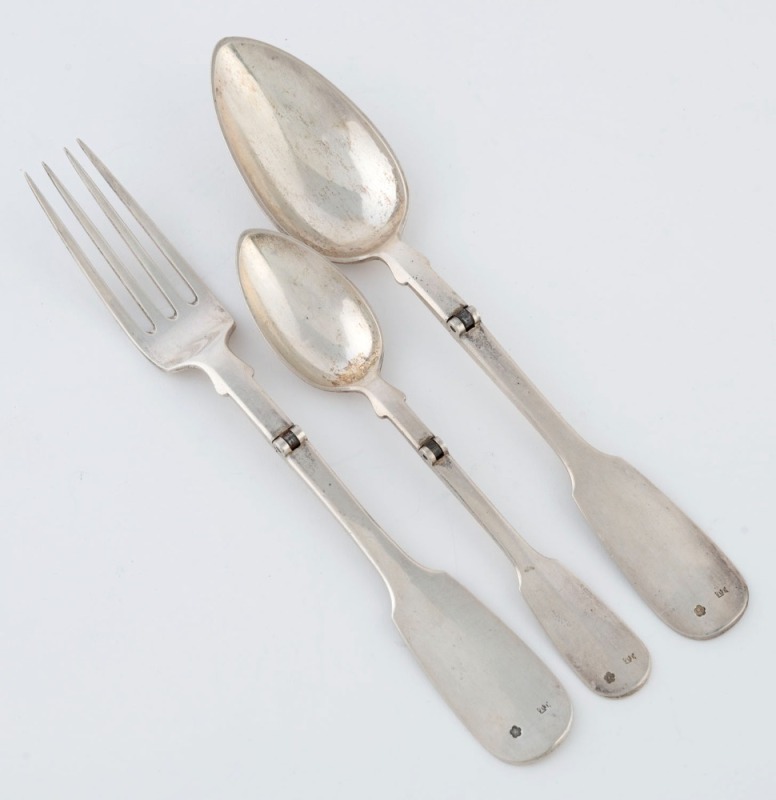 Austro-Hungarian antique silver campaign cutlery set, comprising of two folding spoons and a fork, 19th century, ​​​​​​​the largest spoon 20.5cm long, 164 grams total