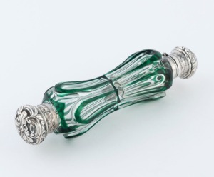 An antique Bohemian green overlay glass double ended scent bottle with silver tops, circa 1860, 14cm long