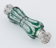 An antique Bohemian green overlay glass double ended scent bottle with silver tops, circa 1860, 14cm long - 2