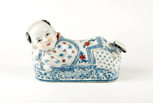 Two Chinese porcelain boy pillows, 20th century