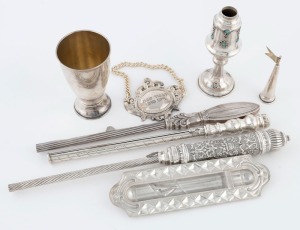JUDAICA group of seven assorted silver items including kiddush cup, wine label, mezuzah case, spice tower, and three candle lighters, 20th century, the largest 33cm long, 450 grams total