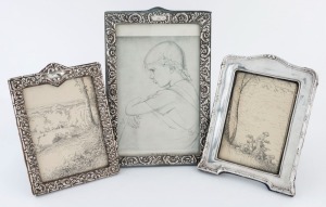 Three assorted sterling silver picture frames, the largest 23cm high