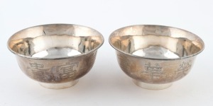 A pair of Chinese export silver bowls with engraved decoration, 19th/20th century, seal mark to base, 5cm high, 10.5cm diameter, 204 grams